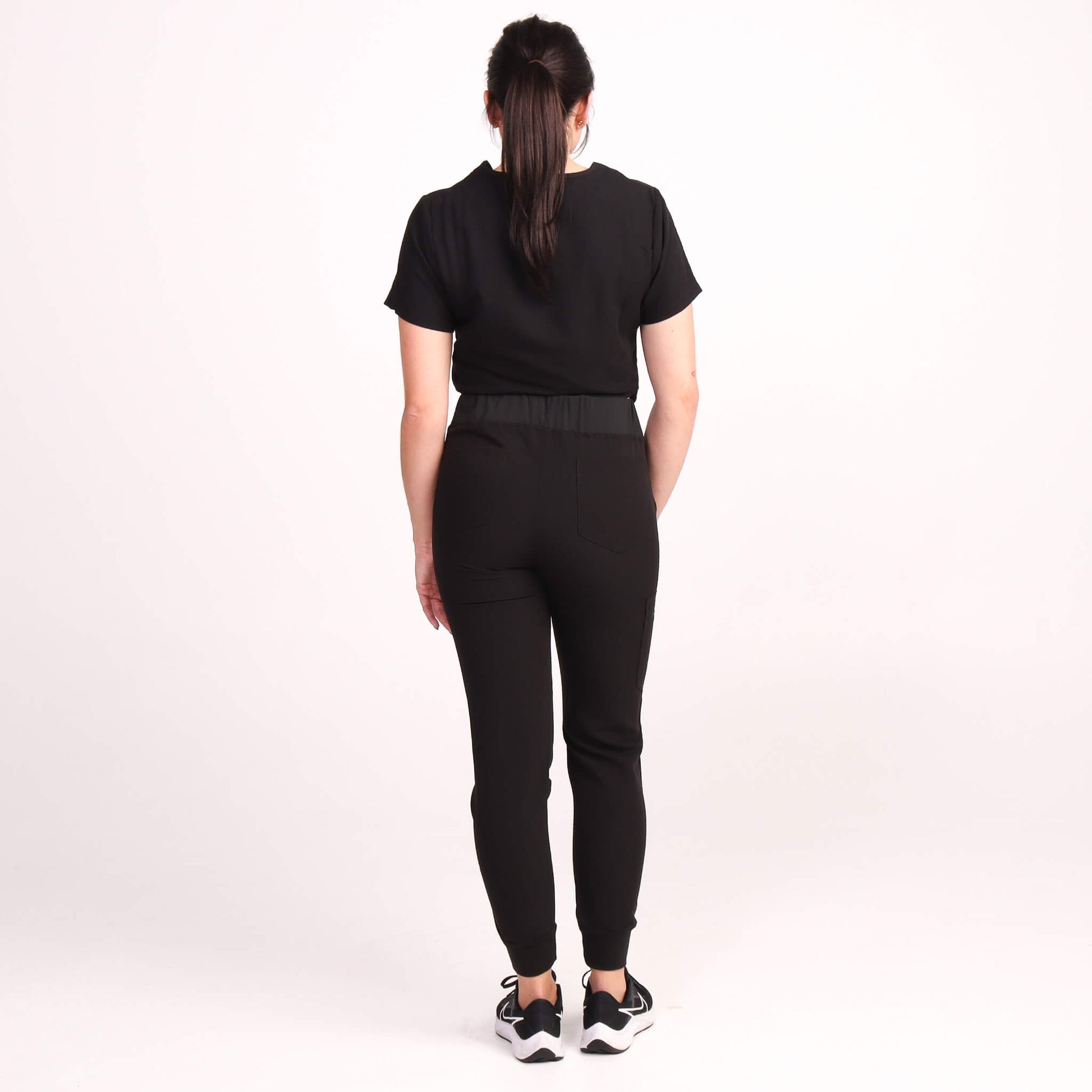 Nurse wearing Black Medical Scrub Jogger Pants and Black Medical Scrub Top from Fit Right Medical Scrubs Australia