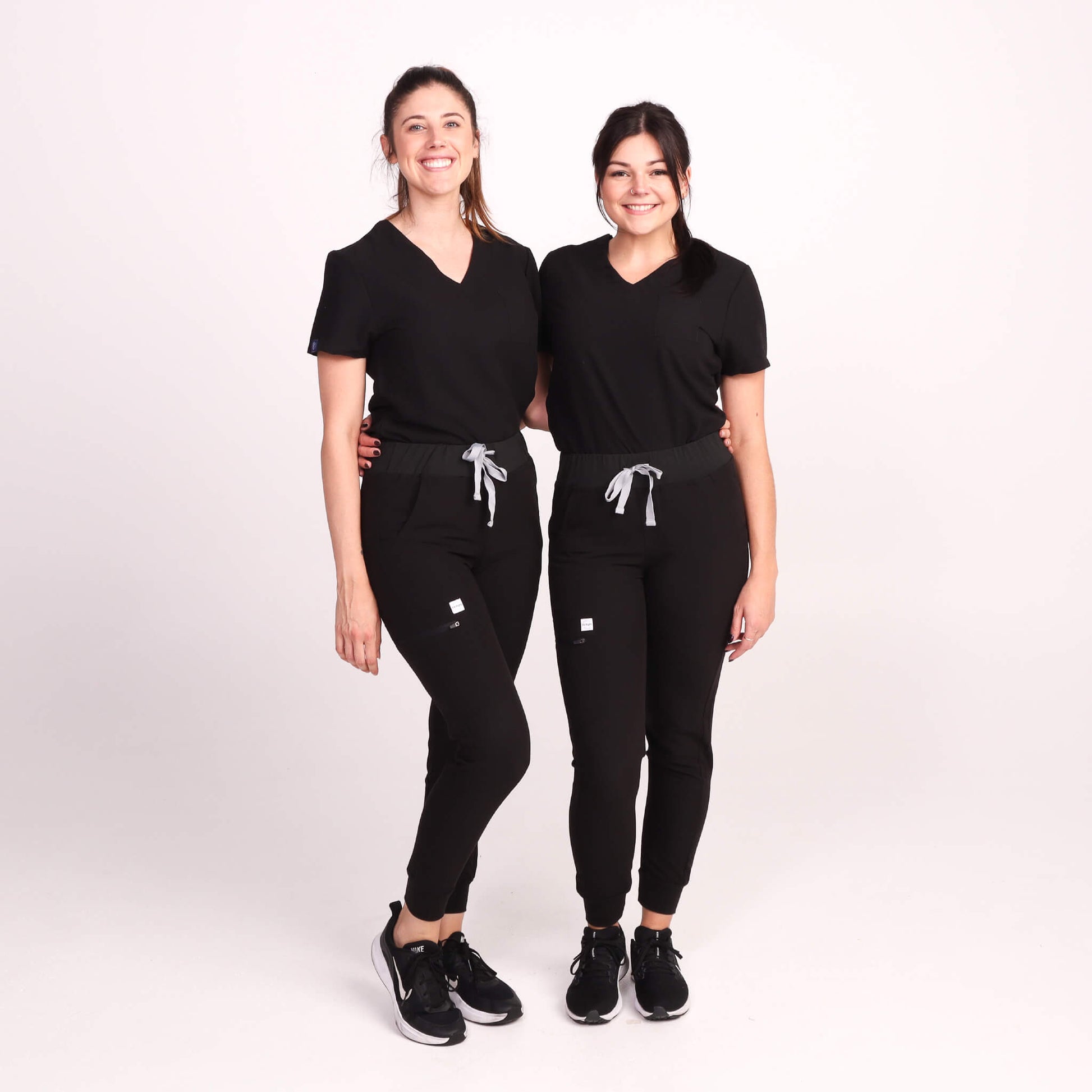 Nurse wearing Black Medical Scrub Jogger Pants and Black Medical Scrub Top from Fit Right Medical Scrubs Australia