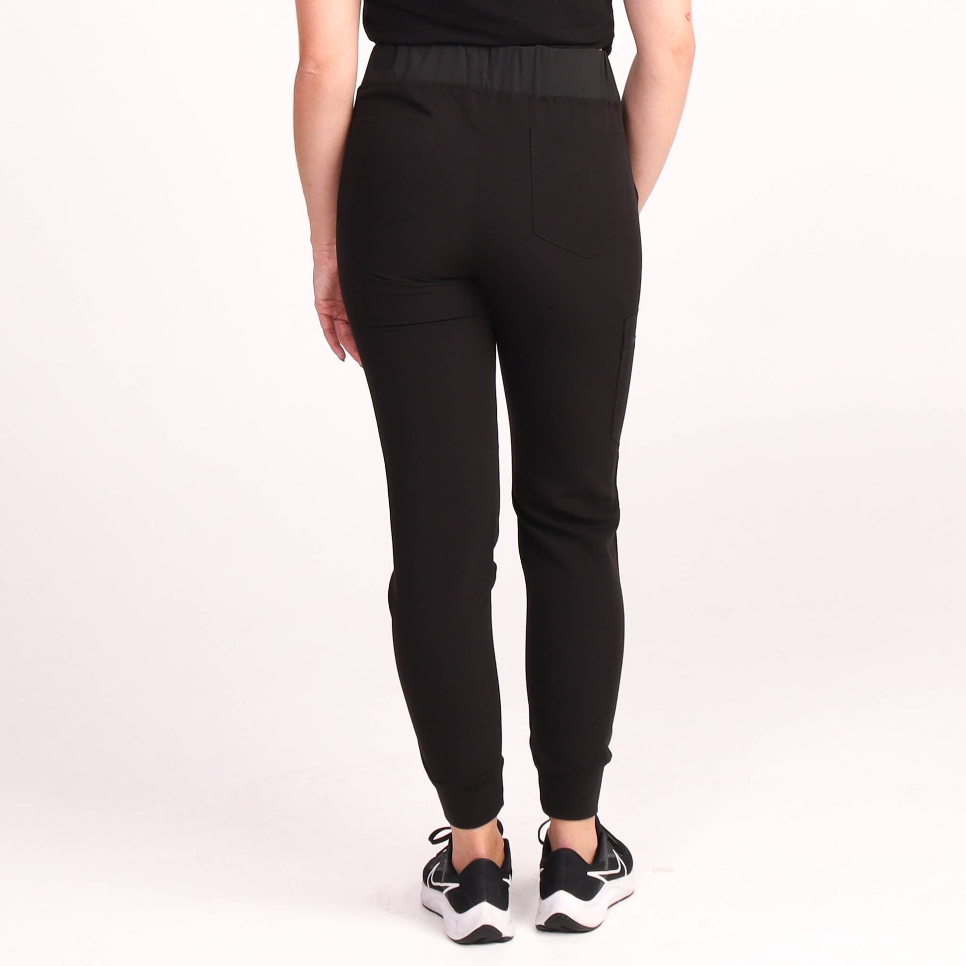 Nurse wearing Black Medical Scrub Jogger Pants and Black Medical Scrub Top from Fit Right Medical Scrubs Australia