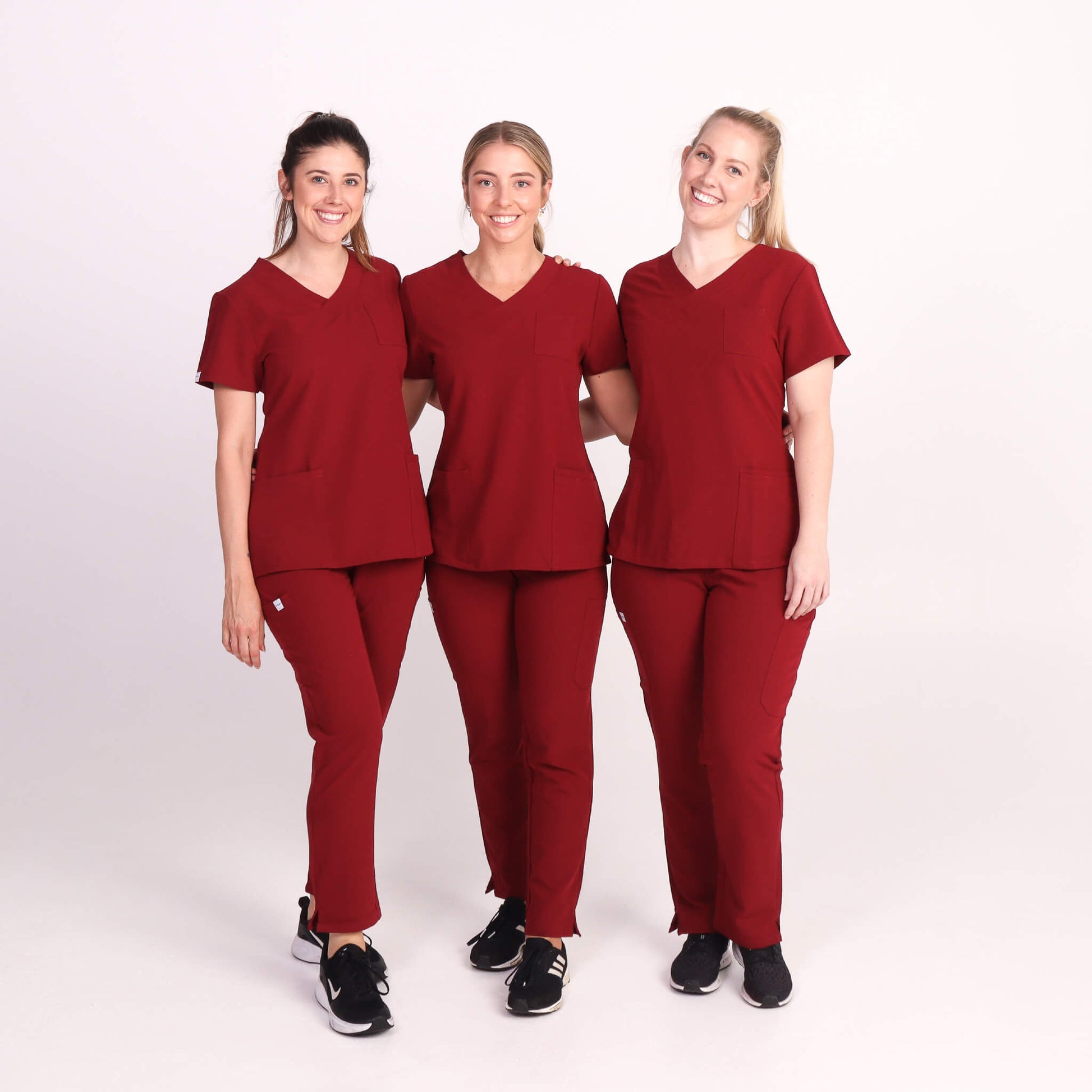 Nurse wearing Burgundy Medical Scrub Set by Fit Right Medical Scrubs. Available online near you today.
