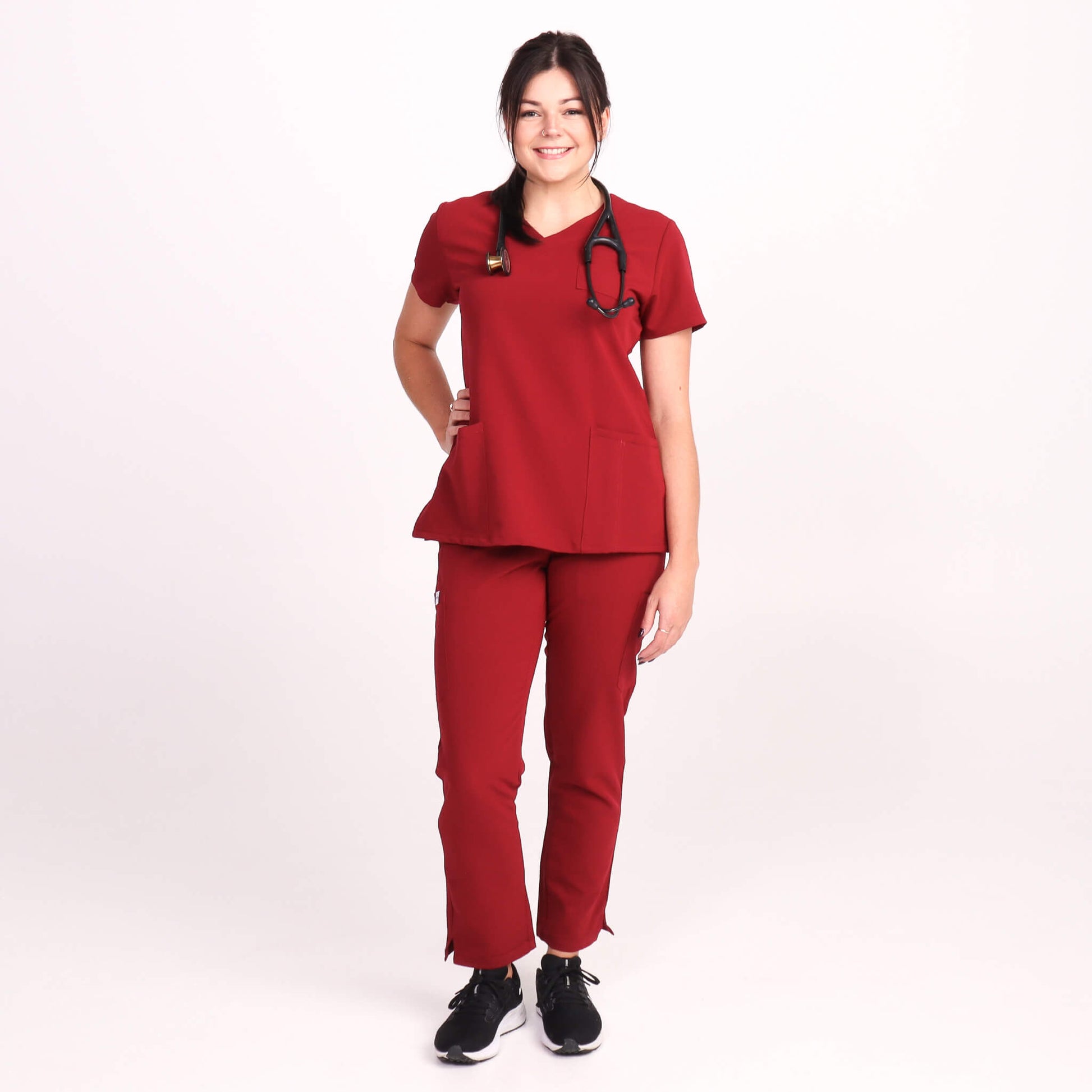 Nurse wearing Burgundy Medical Scrub Set by Fit Right Medical Scrubs. Available online near you today.