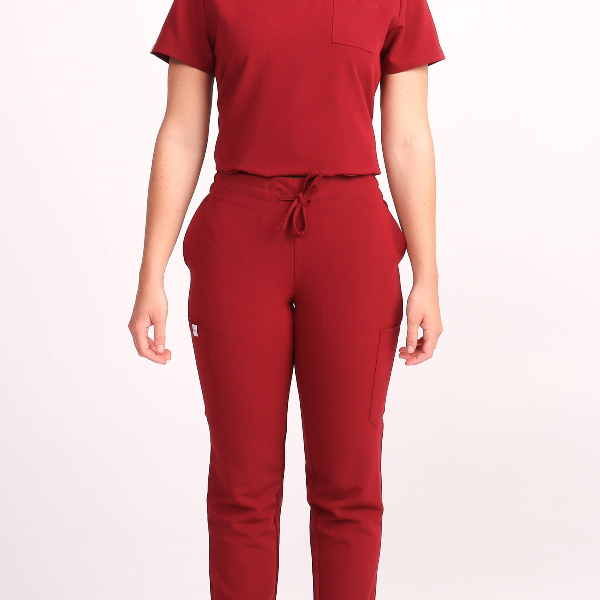 Nurse wearing Burgundy Medical Scrub Set by Fit Right Medical Scrubs. Available online near you today.