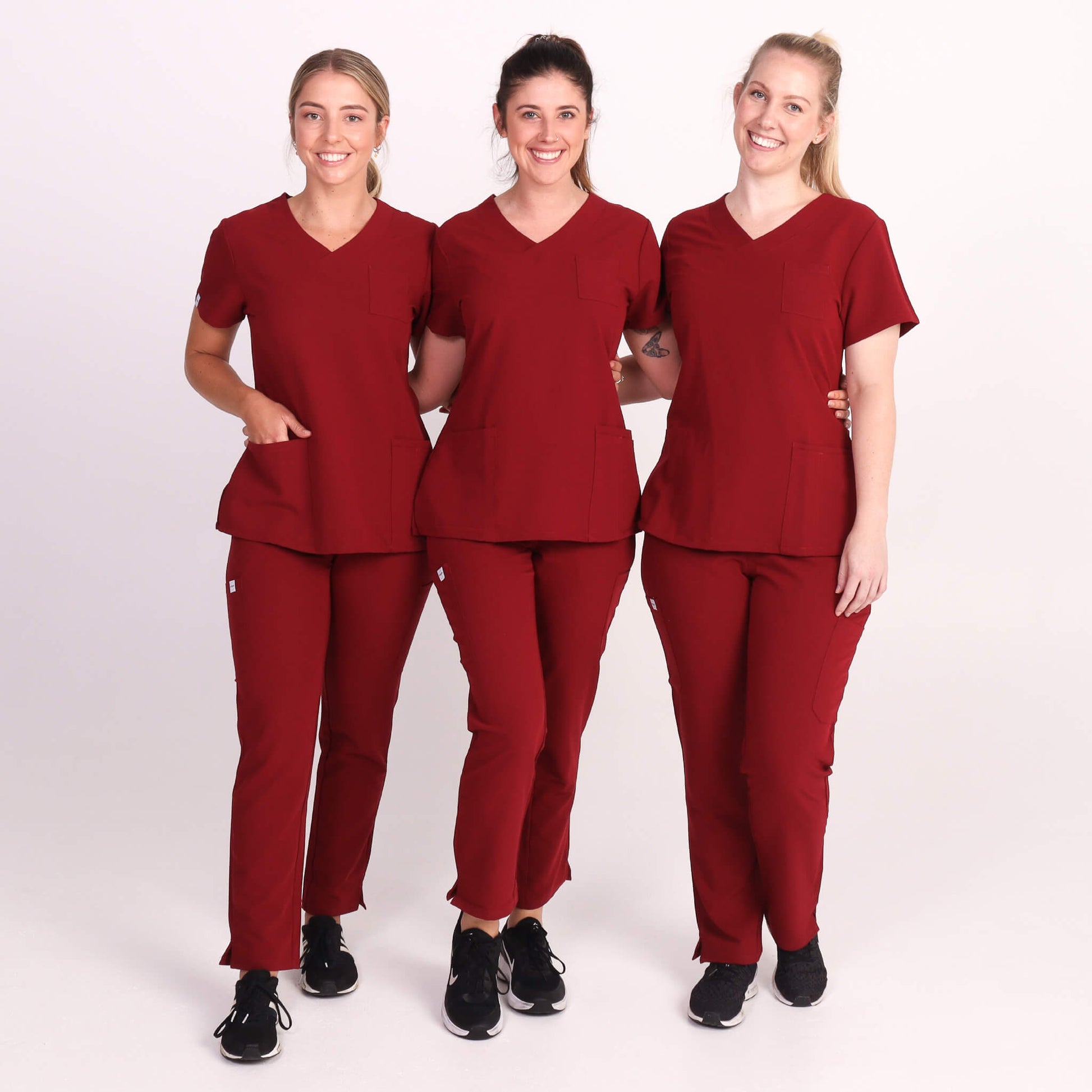 Nurse wearing Burgundy Medical Scrub Set by Fit Right Medical Scrubs. Available online near you today.