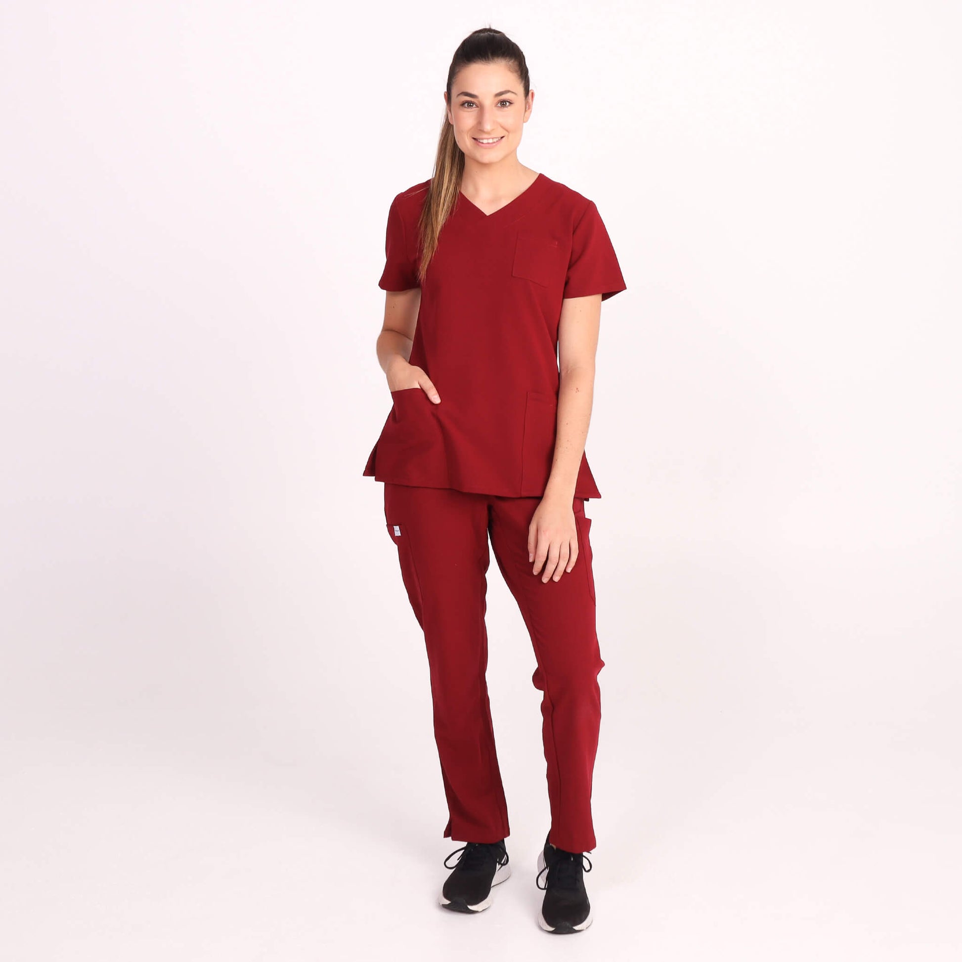 Nurse wearing Burgundy Medical Scrub Set by Fit Right Medical Scrubs. Available online near you today.