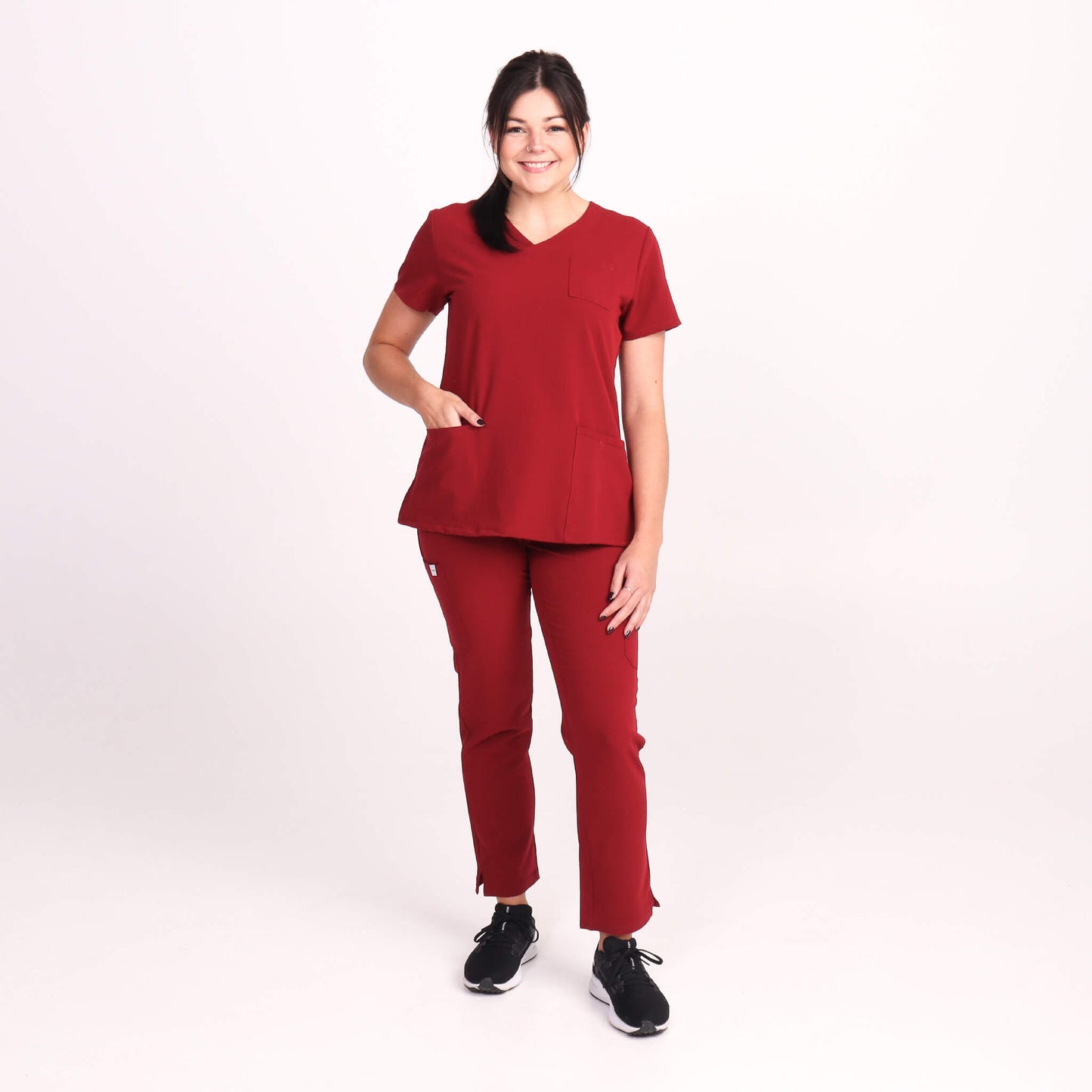 Nurse wearing Burgundy Medical Scrub Set by Fit Right Medical Scrubs. Available online near you today.