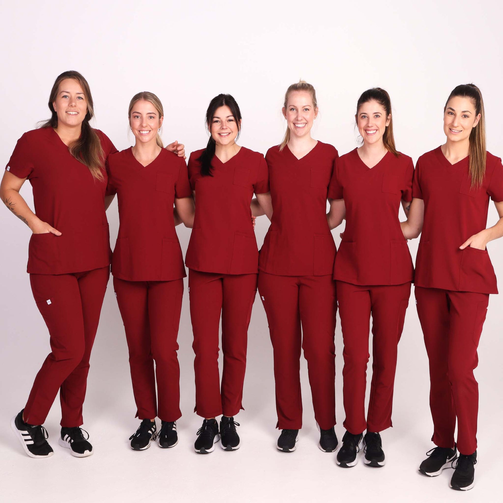 Nurse wearing Burgundy Medical Scrub Set by Fit Right Medical Scrubs. Available online near you today.
