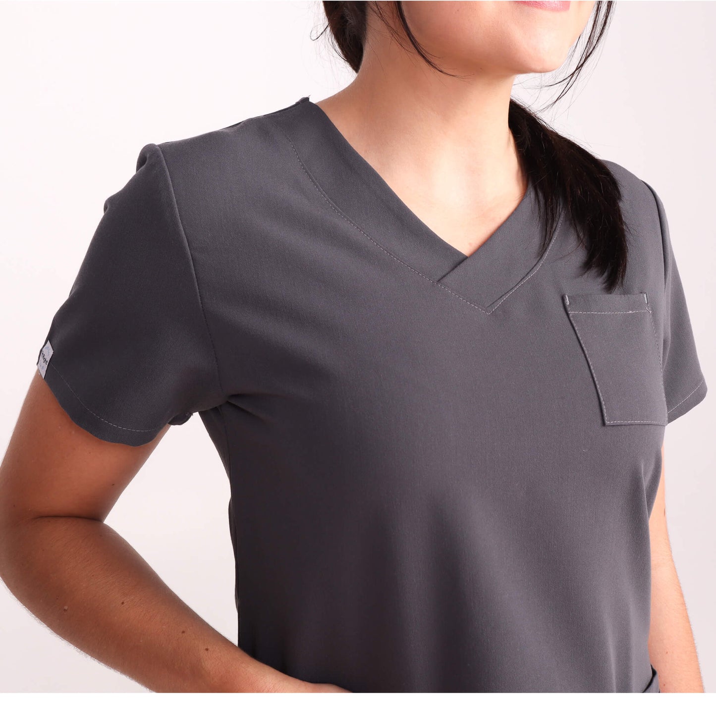 Nurse wearing Charcoal/Grey Medical Scrub Set by Fit Right Medical Scrubs. Available online near you today.