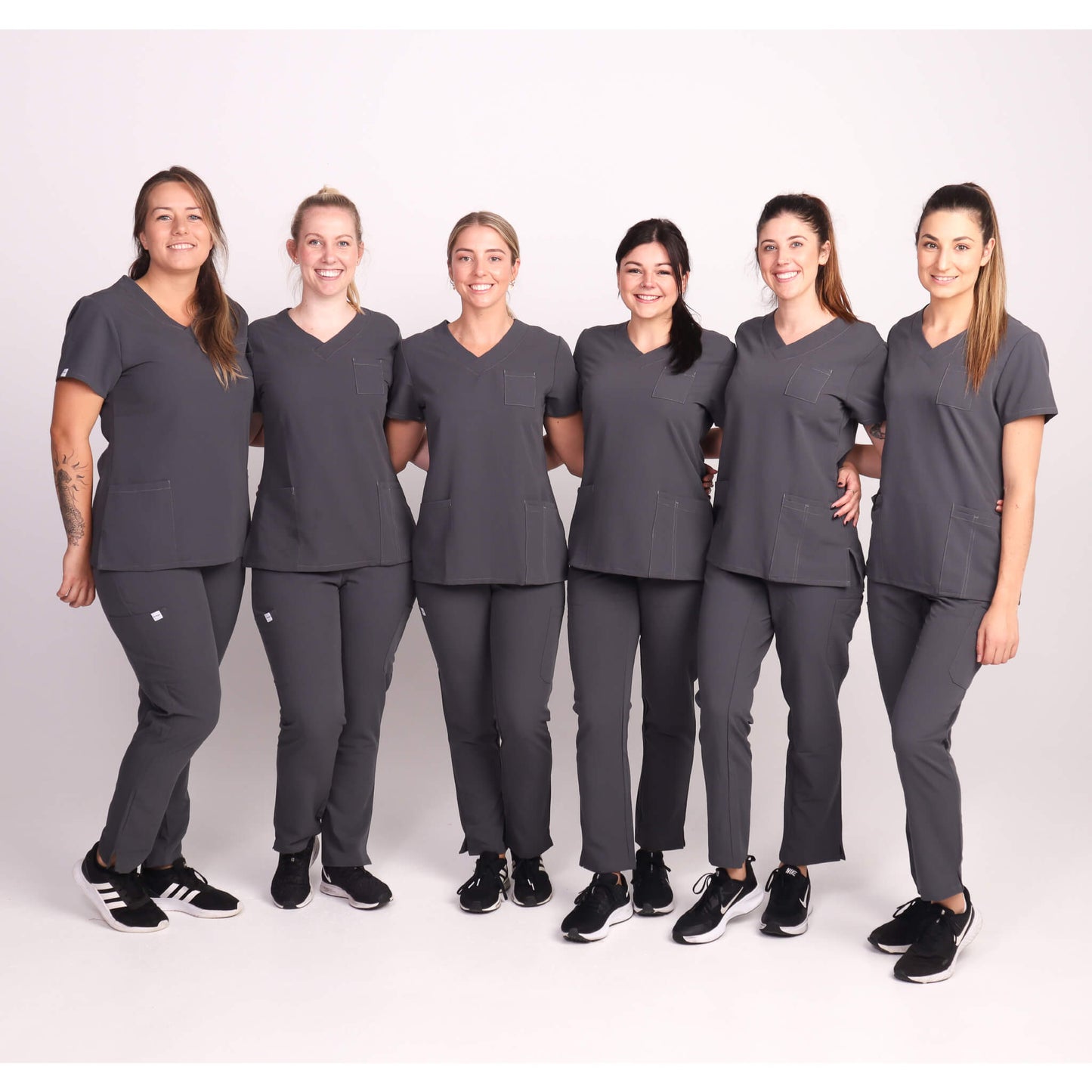 Nurse wearing Charcoal/Grey Medical Scrub Set by Fit Right Medical Scrubs. Available online near you today.