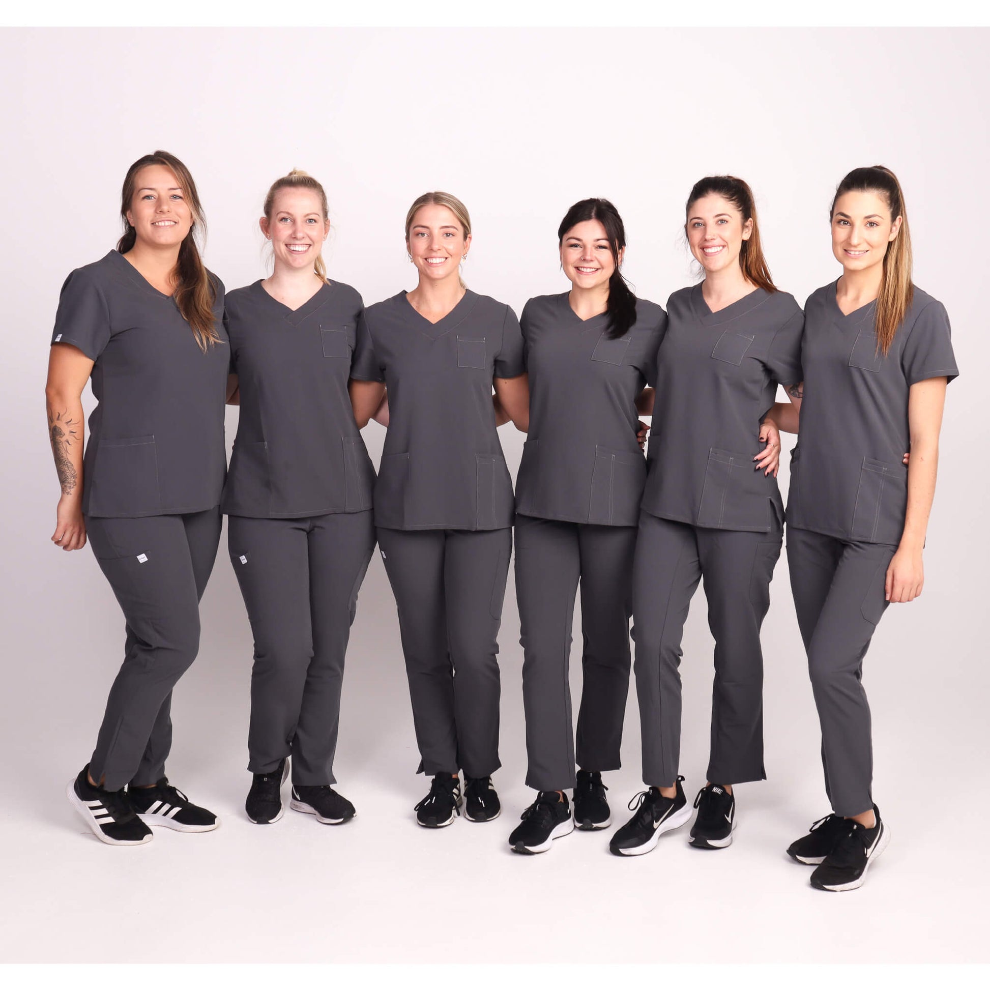 Nurse wearing Charcoal/Grey Medical Scrub Set by Fit Right Medical Scrubs. Available online near you today.