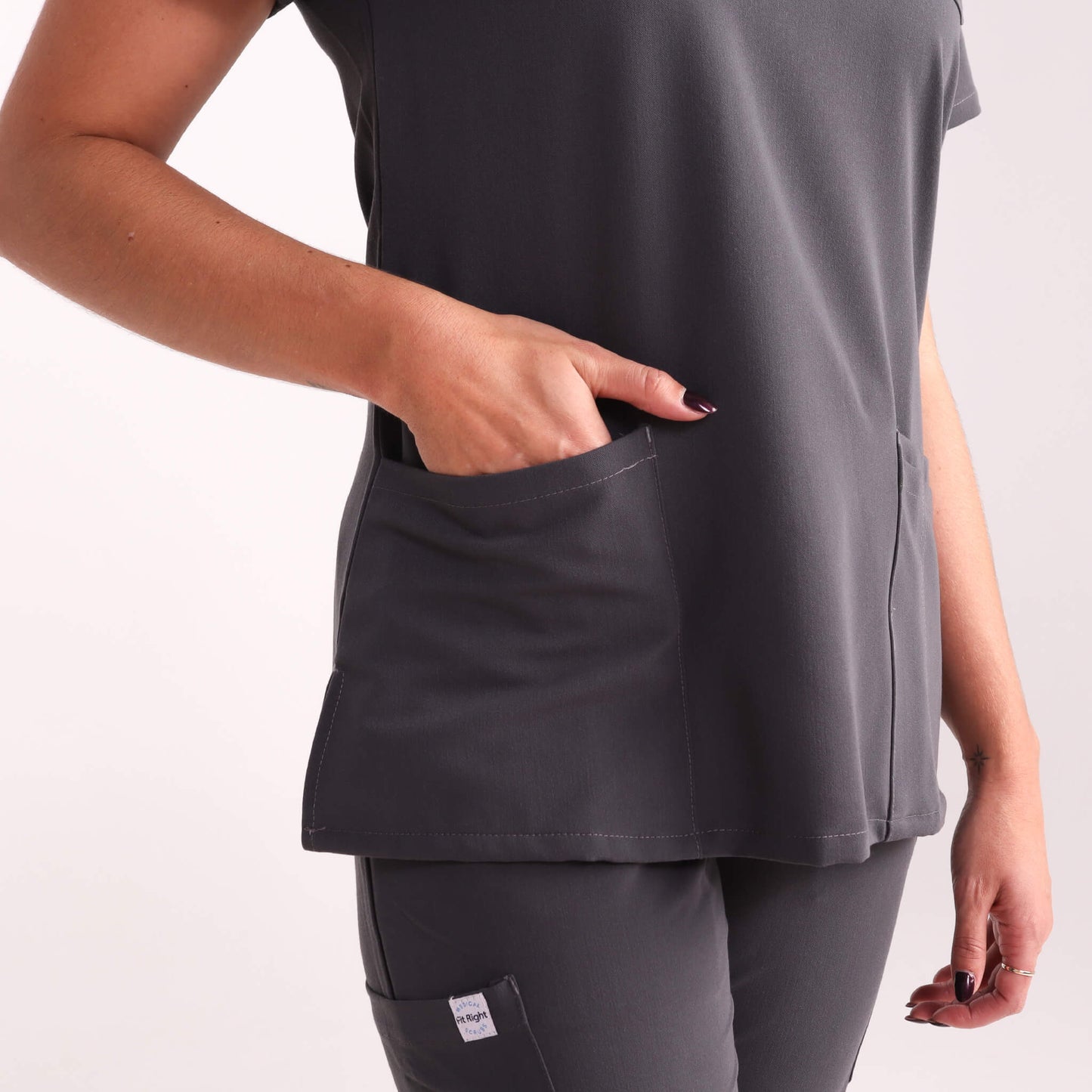 Nurse wearing Charcoal/Grey Medical Scrub Set by Fit Right Medical Scrubs. Available online near you today.