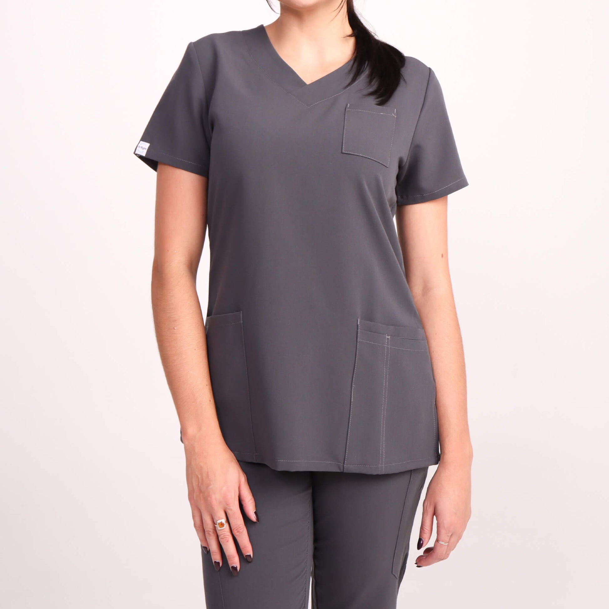 Nurse wearing Charcoal/Grey Medical Scrub Set by Fit Right Medical Scrubs. Available online near you today.