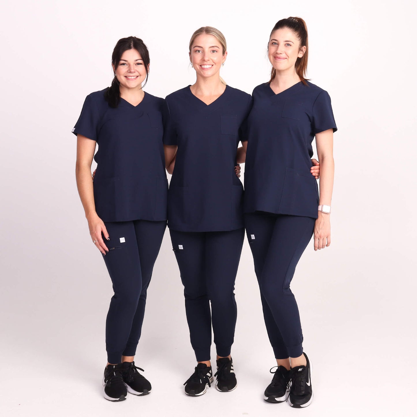 Nurses wearing Navy Medical Jogger Scrub Pants and Navy Medical Scrub Top from Fit Right Medical Scrubs Australia
