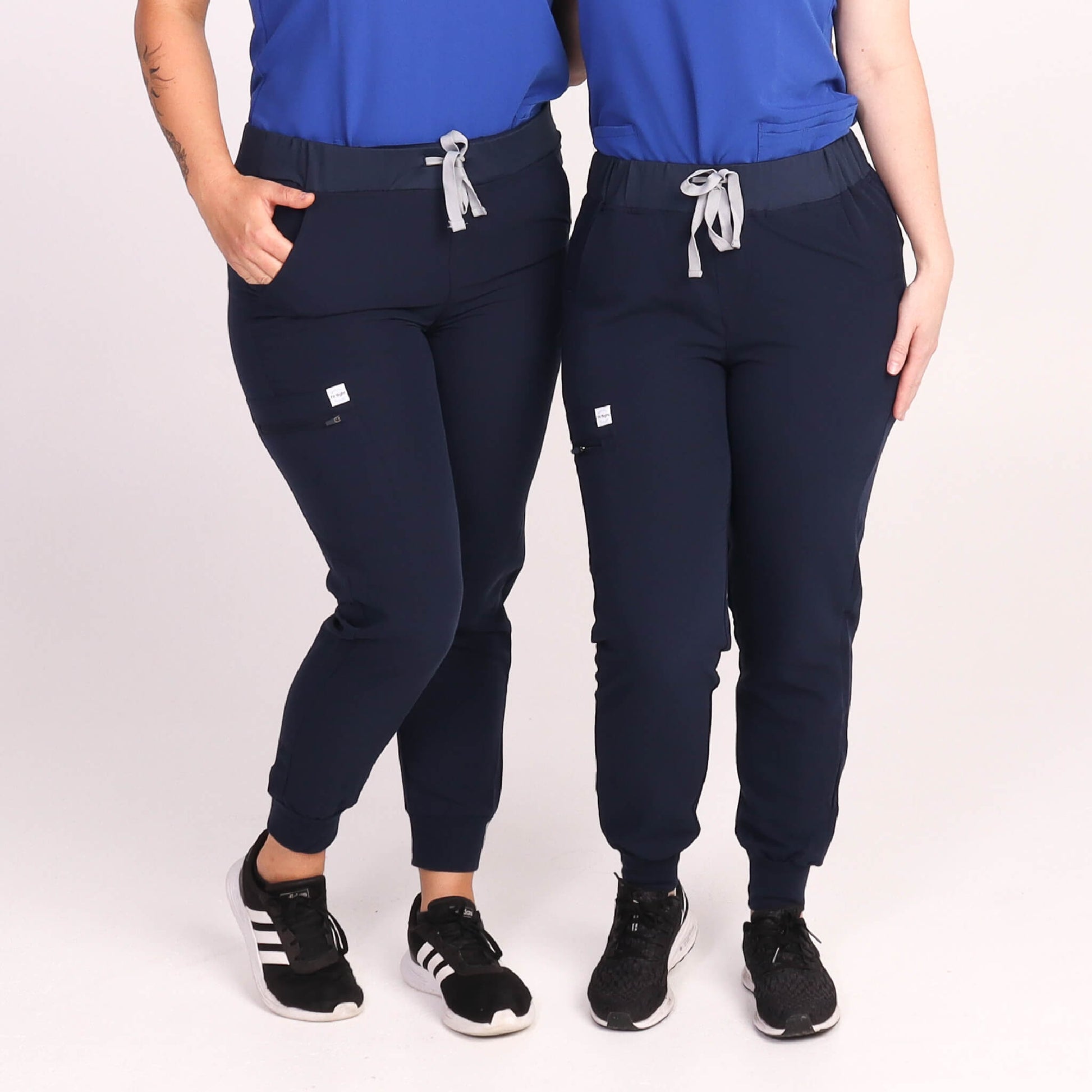 Nurses wearing Navy Medical Jogger Scrub Pants and Navy & Royal Blue Medical Scrub Top from Fit Right Medical Scrubs Australia