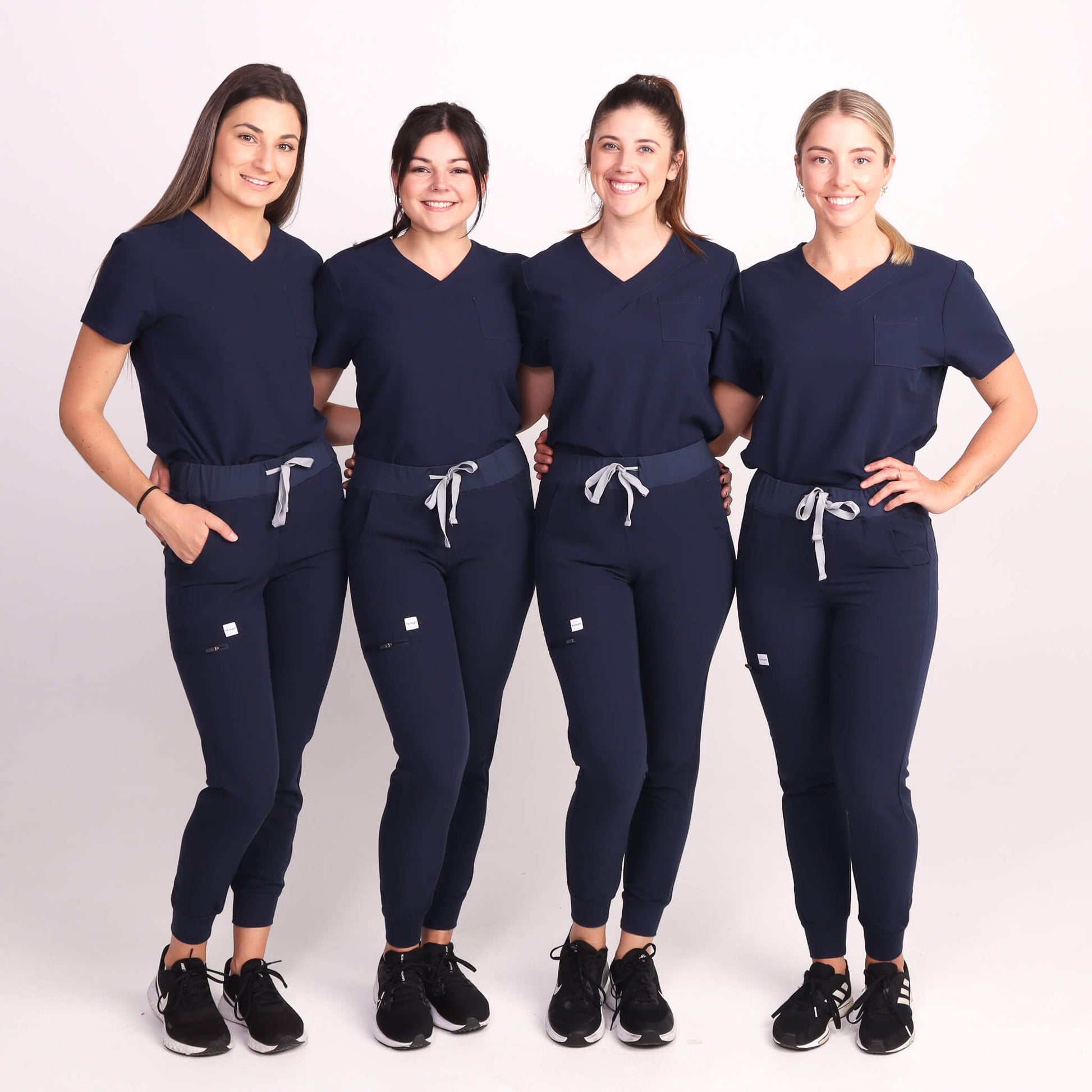 Nurses wearing Navy Medical Jogger Scrub Pants and Navy Medical Scrub Top from Fit Right Medical Scrubs Australia