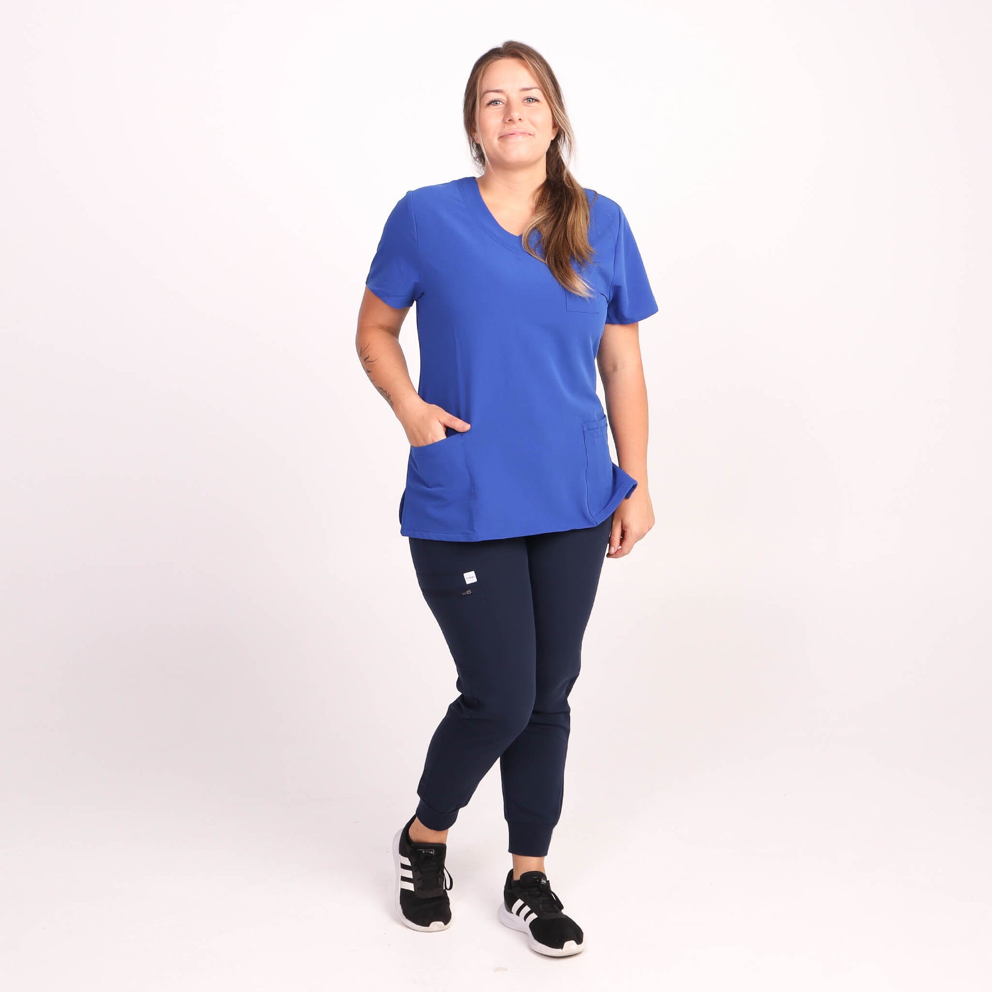 Nurses wearing Navy Medical Jogger Scrub Pants and Navy & Royal Blue Medical Scrub Top from Fit Right Medical Scrubs Australia