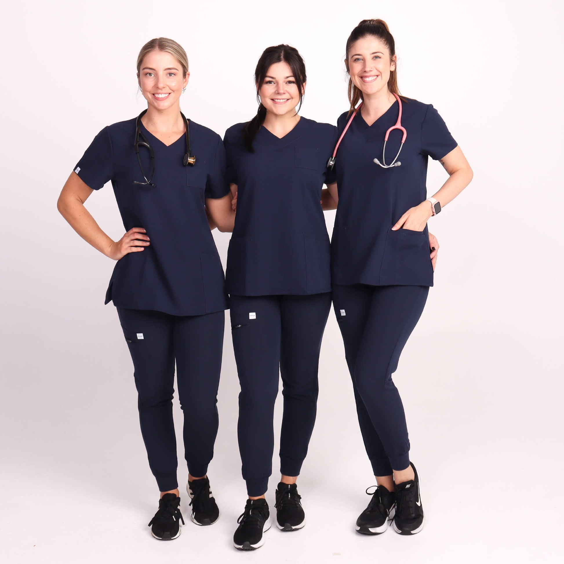 Nurse wearing Navy Medical Jogger Scrub Pants and Navy Medical Scrub Top from Fit Right Medical Scrubs Australia