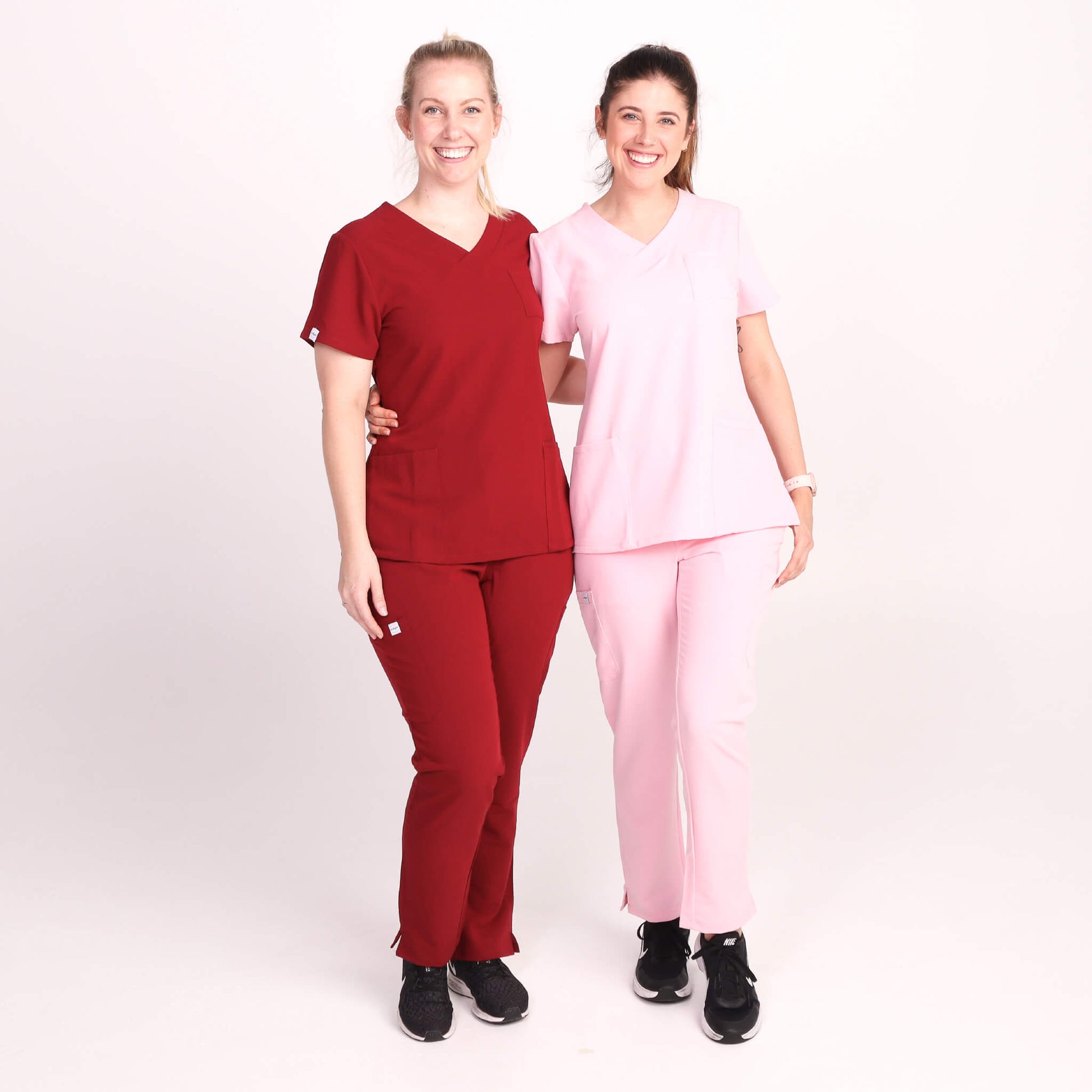 Nurse wearing Pink Medical Scrub Set from Fit Right Medical Scrubs