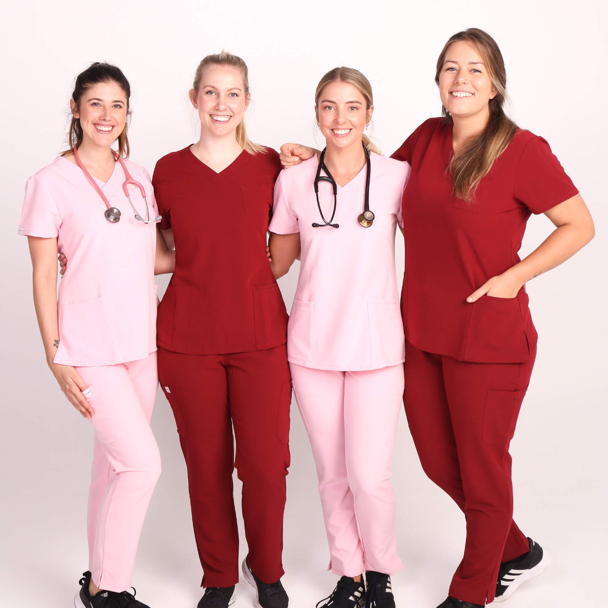 Nurse wearing Pink Medical Scrub Set from Fit Right Medical Scrubs