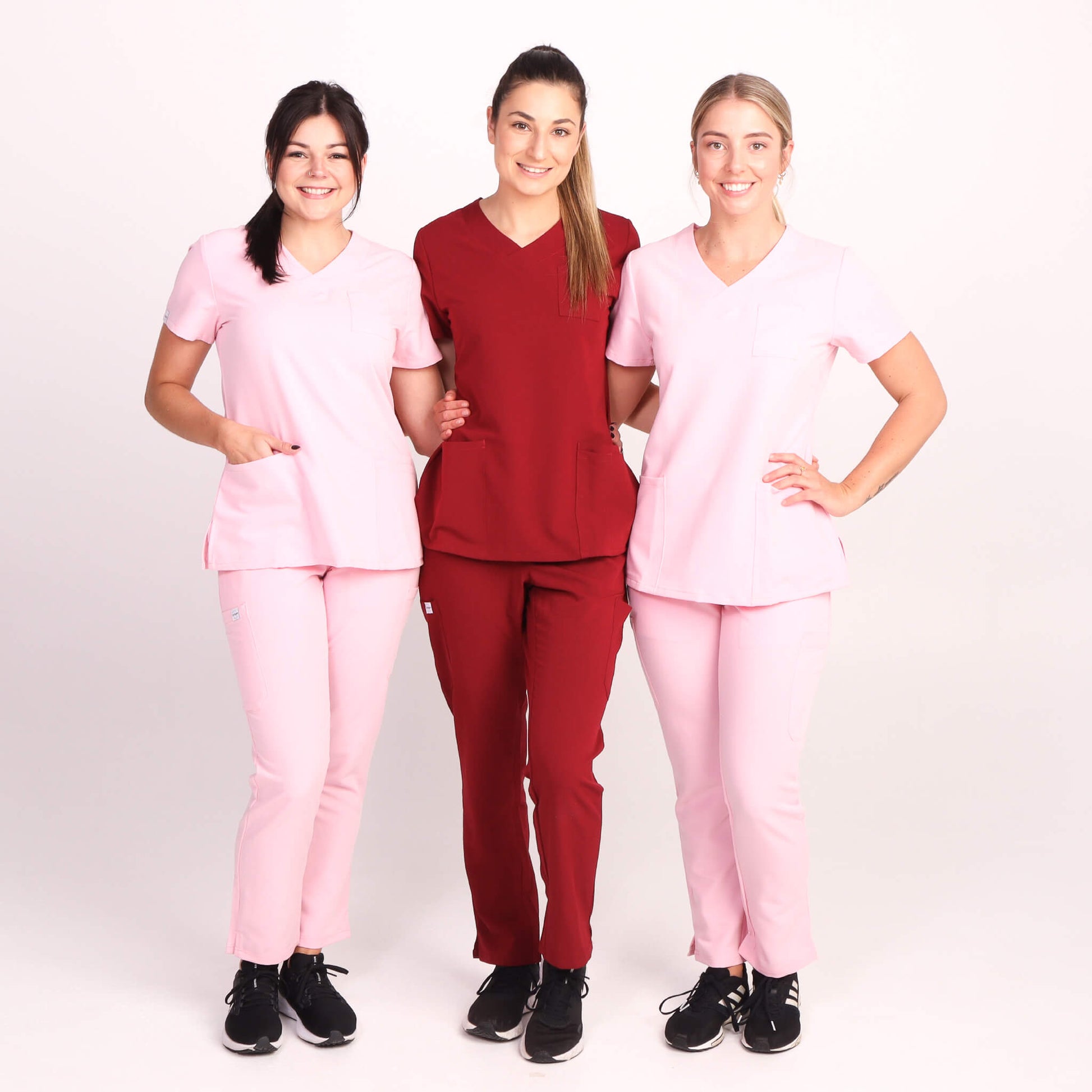 Nurse wearing Pink Medical Scrub Set from Fit Right Medical Scrubs