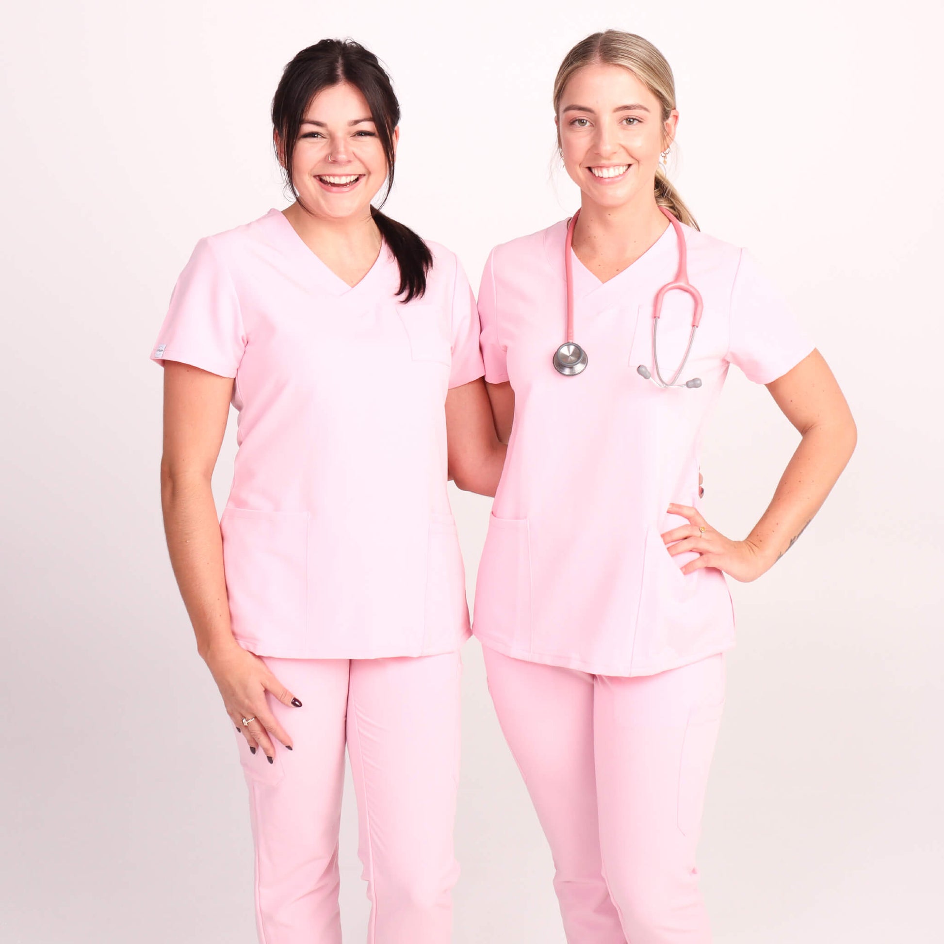 Nurse wearing Pink Medical Scrub Set from Fit Right Medical Scrubs