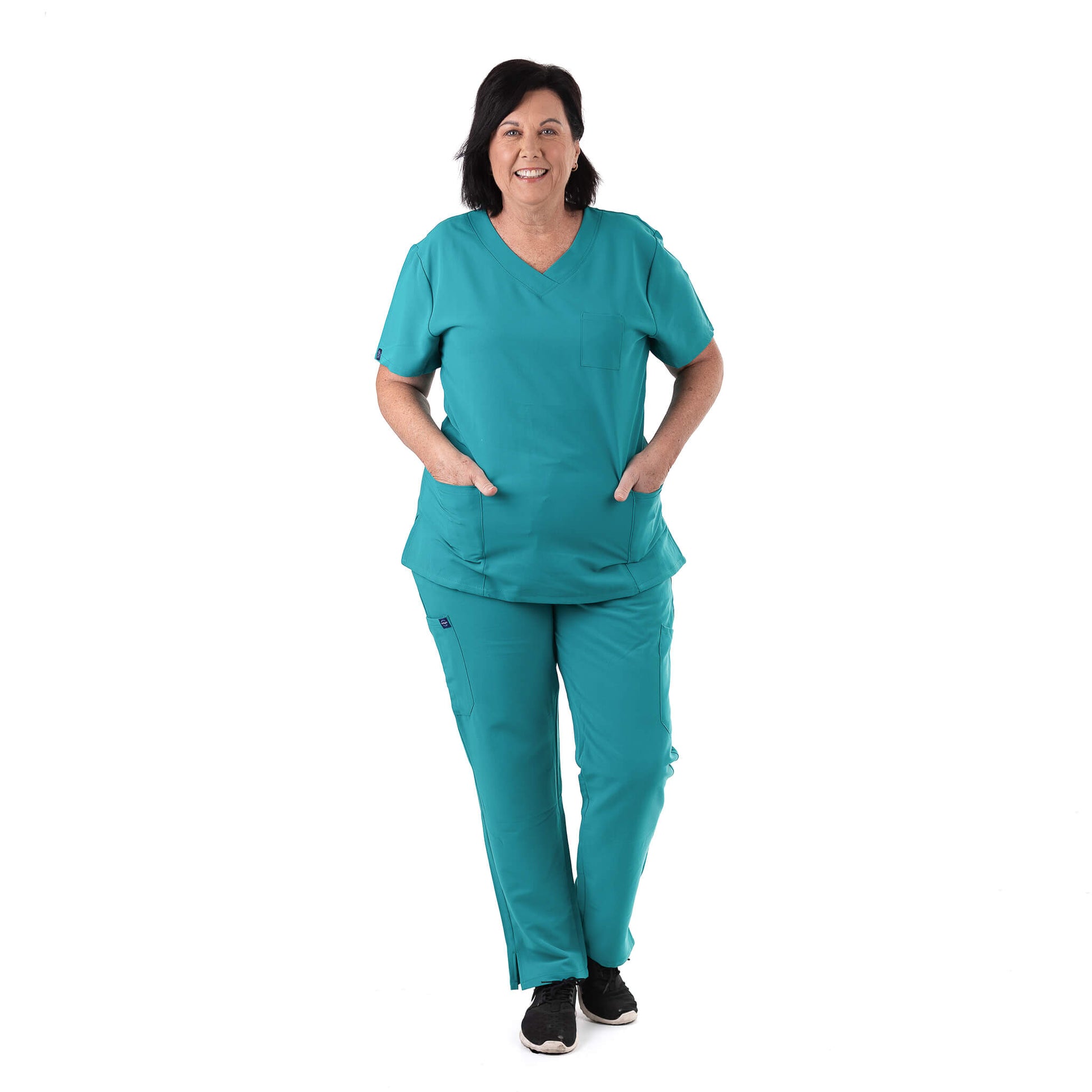 Nurse wearing Teal Medical Scrub Set from Fit Right Medical Scrubs